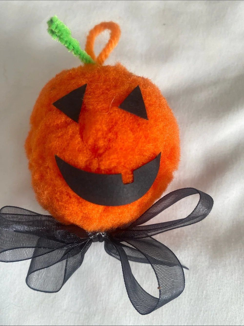 Source Unknown Orange Pumpkin Ball with White felt Ghost.